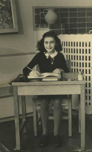 Young Anne Frank at School in 1940. By Unknown photographer; Collectie Anne Frank Stichting Amsterdam (Website Anne Frank Stichting, Amsterdam) [Public domain], via Wikimedia Commons.