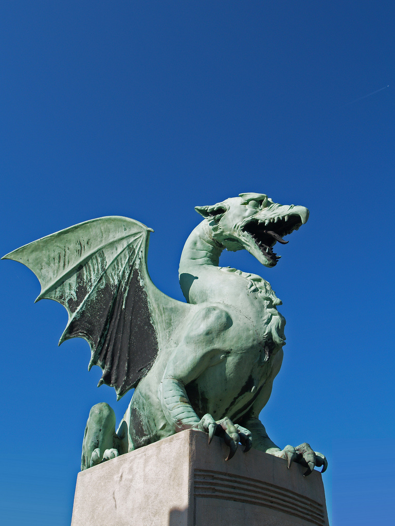 Dragon at the Dragon Bridge, Ljublana. Taken by Maik-T. Šebenik via Flickr.