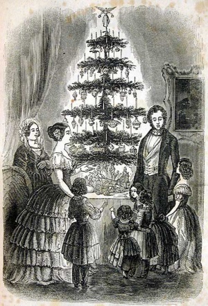 Queen Victoria and Prince Albert around their Christmas tree. By Godey's Lady's Book [Public domain], via Wikimedia Commons